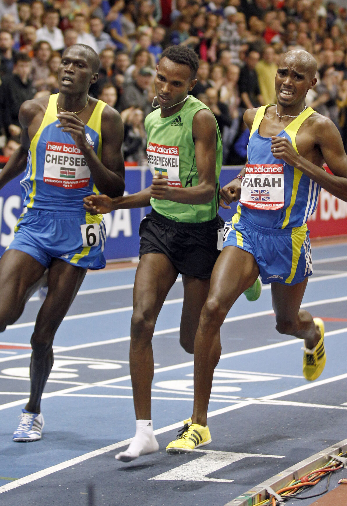 2011: Dejen Gebremeskel loses shoe at start of race, wins men's 3,000 anyway